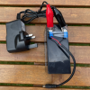 12 volt battery charger and 1.2 Ampere Hour lead acetate battery.